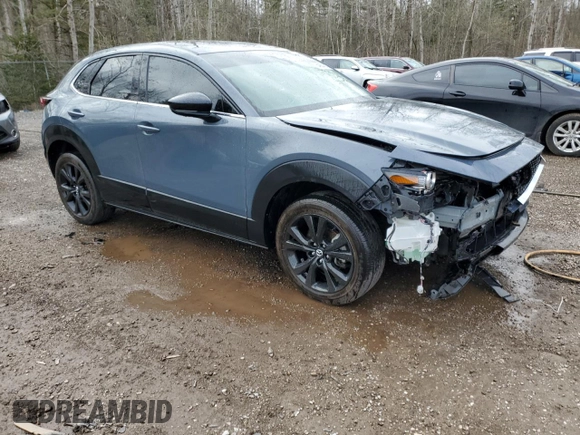 2023 Mazda CX-30 S Premium z VIN 3MVDMBDM5PM538276, wystawiony jako Copart lot #54654615 z przebiegiem 35 629 mil mil oraz Szkoda całkowita • Salvage title. Historia ofert i sprzedaży dostępna na DreamBid. Obrazek 4.