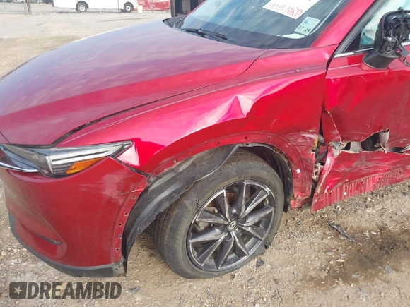 2017 Mazda CX-5 Grand Touring with VIN JM3KFADL8H0189033, listed as a IAAI auction lot 40029931 with 88,933 mi miles and . Bid and sale history available at carsss.com. Image 18.