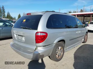 2003 Dodge Grand Caravan with VIN 2D4GP74L83R157134, listed as a IAAI auction lot 41698861 with 155,818 mi miles and . Bid and sale history available at DreamBid. Image 4.