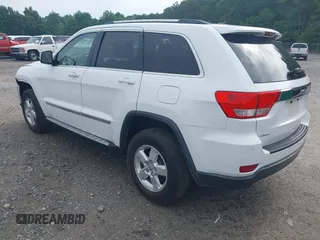 2013 Jeep Grand Cherokee Laredo с VIN 1C4RJEAG6DC647164, выставлен на аукционе IAAI как лот 42282295 с пробегом 128 511 миль миль и . История ставок и продаж доступна на DreamBid. Изображение 3.