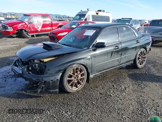 2004 Subaru Impreza Sedan (Natl) WRX STi w/Gold Wheels with VIN JF1GD70684L523325, listed as a IAAI auction lot 41372289 with 146,065 mi miles. Bid and sale history available at carsss.com. Image 2.