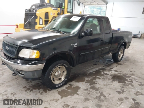 2000 Ford F-150 XL with VIN 1FTRX18W9YNB67215, listed as a IAAI auction lot 42558112 with 118,628 mi miles and . Bid and sale history available at DreamBid. Image 2.