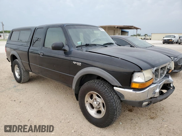 2000 Ford Ranger XLT with VIN 1FTZR15X7YPB39800, listed as a Copart auction lot 55661405 with 228,926 mi miles and Salvage title. Bid and sale history available at DreamBid. Image 4.
