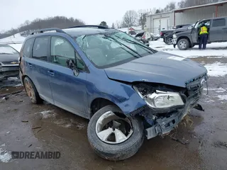 2014 Subaru Forester 2.5i Premium with VIN JF2SJAECXEH421197, listed as a IAAI auction lot 41642959 with 74,857 mi miles. Bid and sale history available at carsss.com. Image 1.