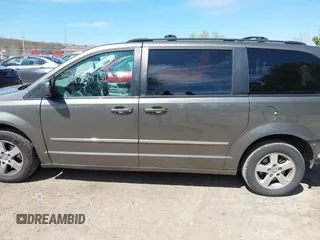 2010 Dodge Grand Caravan SXT with VIN 2D4RN5D1XAR293862, listed as a IAAI auction lot 42179737 with 324,144 mi miles and . Bid and sale history available at DreamBid. Image 14.