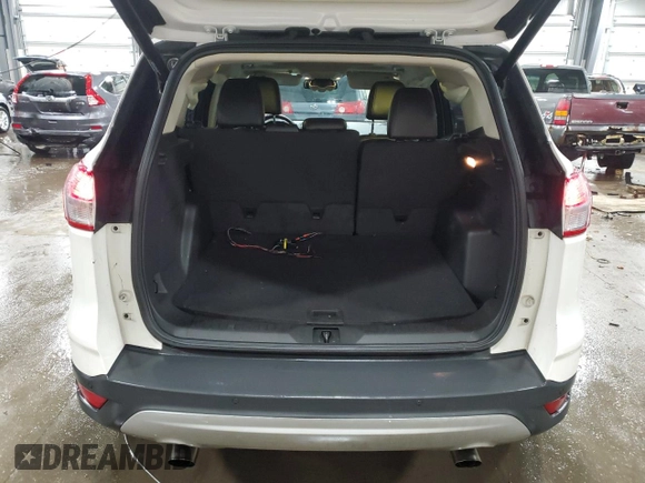 2016 Ford Escape Titanium with VIN 1FMCU9J99GUB20719, listed as a Copart auction lot 46063015 with 85,887 mi miles and Salvage Title. Bid and sale history available at carsss.com. Image 6.
