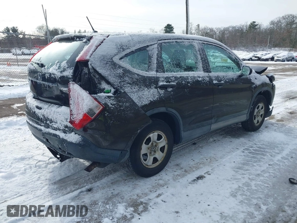 2014 Honda CR-V LX with VIN 2HKRM4H31EH685251, listed as a IAAI auction lot 41353619 with 125,793 mi miles and . Bid and sale history available at carsss.com. Image 4.
