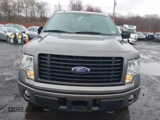 2014 Ford F-150 XL with VIN 1FTFX1EF8EFA97820, listed as a IAAI auction lot 41974347 with 148,018 mi miles. Bid and sale history available at carsss.com. Image 12.