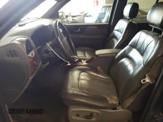 2003 GMC Envoy SLT with VIN 1GKDT13S732208692, listed as a Copart auction lot 67475514 with 243,146 mi miles and Salvage Title. Bid and sale history available at carsss.com. Image 7.