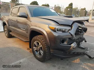 2017 Toyota Tacoma SR5 with VIN 3TMAZ5CN9HM049091, listed as a IAAI auction lot 41266705 with 76,520 mi miles. Bid and sale history available at carsss.com. Image 1.