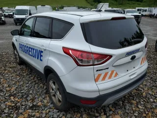 2014 Ford Escape SE z VIN 1FMCU9GX8EUC02895, wystawiony jako IAAI lot #42511705 z przebiegiem 104 900 mil mil oraz . Historia ofert i sprzedaży dostępna na DreamBid. Obrazek 23.
