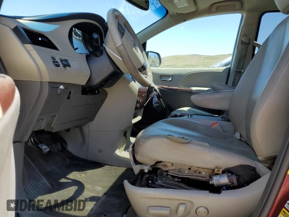 2012 Toyota Sienna XLE with VIN 5TDDK3DC0CS041425, listed as a Copart auction lot 60286305 with 214,634 mi miles and Salvage title. Bid and sale history available at DreamBid. Image 7.