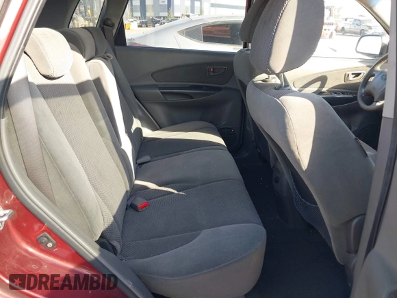2008 Hyundai Tucson SE with VIN KM8JN12D28U913130, listed as a IAAI auction lot 41915402 with 208,907 mi miles. Bid and sale history available at carsss.com. Image 8.