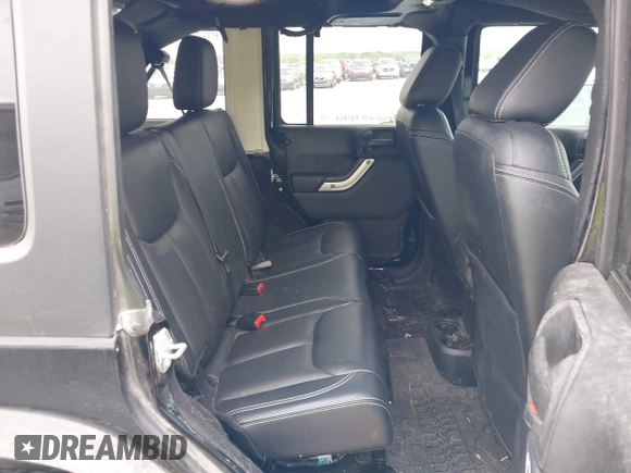 2015 Jeep Wrangler Unlimited Rubicon z VIN 1C4BJWFG2FL572417, wystawiony jako IAAI lot #41895927 z przebiegiem 54 981 mil mil oraz . Historia ofert i sprzedaży dostępna na DreamBid. Obrazek 8.