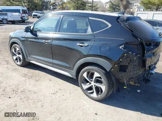 2018 Hyundai Tucson Value with VIN KM8J3CA26JU700642, listed as a IAAI auction lot 41655085 with 80,903 mi miles. Bid and sale history available at carsss.com. Image 3.