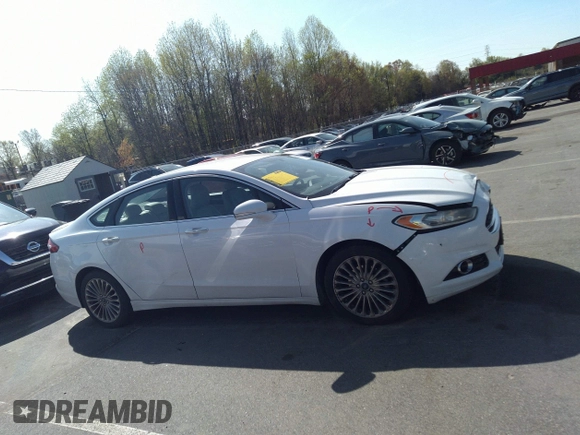 2016 Ford Fusion Titanium with VIN 3FA6P0K93GR347016, listed as a IAAI auction lot 41850780 with 215,872 mi miles and . Bid and sale history available at carsss.com. Image 13.