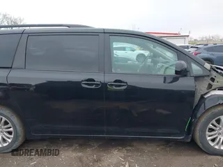 2011 Toyota Sienna XLE AAS with VIN 5TDYK3DC9BS071636, listed as a IAAI auction lot 41972332 with 204,477 mi miles and . Bid and sale history available at DreamBid. Image 14.