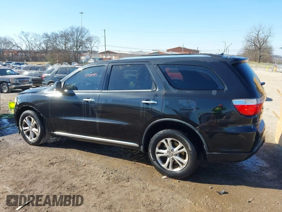 2013 Dodge Durango Crew with VIN 1C4SDHDT3DC553939, listed as a IAAI auction lot 41404491 with 148,505 mi miles and . Bid and sale history available at carsss.com. Image 14.