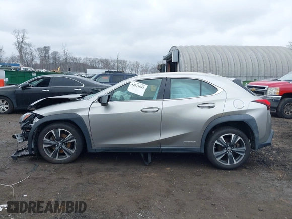 2019 Lexus UX 250h z VIN JTHU9JBH9K2008345, wystawiony jako IAAI lot #42019642 z przebiegiem Nie podano mil oraz . Historia ofert i sprzedaży dostępna na DreamBid. Obrazek 13.