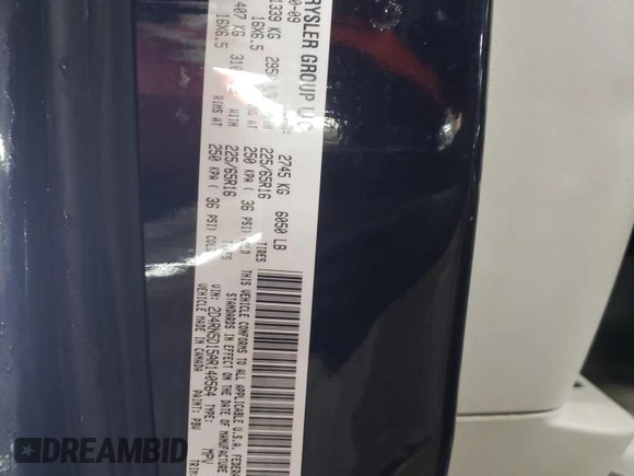 2010 Dodge Grand Caravan SXT with VIN 2D4RN5D15AR140564, listed as a Copart auction lot 52735825 with 187,744 mi miles and Salvage Title. Bid and sale history available at DreamBid. Image 13.