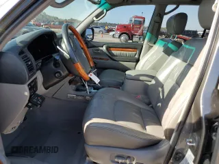 2006 Lexus LX 470 z VIN JTJHT00W664007502, wystawiony jako Copart lot #47871885 z przebiegiem 172 552 mil mil oraz Szkoda całkowita • Salvage title. Historia ofert i sprzedaży dostępna na DreamBid. Obrazek 7.