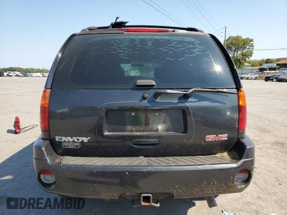 2004 GMC Envoy SLT with VIN 1GKDT13SX42423677, listed as a Copart auction lot 69012884 with Not Provided miles and Clean Title. Bid and sale history available at carsss.com. Image 6.