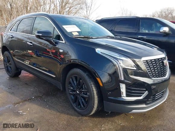 2021 Cadillac XT5 AWD Premium Luxury with VIN 1GYKNDRS0MZ135660, listed as a IAAI auction lot 41123089 with 26,361 mi miles. Bid and sale history available at carsss.com. Image 1.