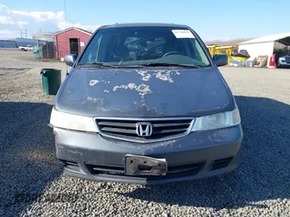 2003 Honda Odyssey EX-L with VIN 5FNRL18993B039943, listed as a IAAI auction lot 41742829 with 227,581 mi miles and . Bid and sale history available at DreamBid. Image 12.