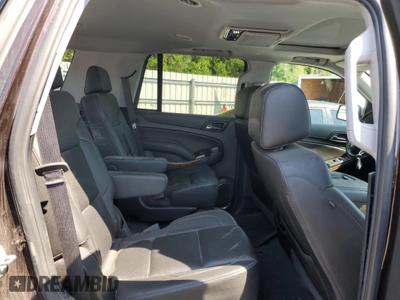 2020 Chevrolet Tahoe Premier with VIN 1GNSKCKC4LR217375, listed as a Copart auction lot 53396524 with 93,035 mi miles and Salvage title. Bid and sale history available at DreamBid. Image 11.