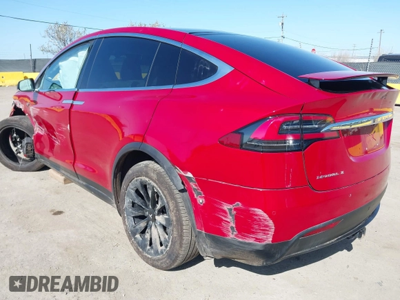 2016 Tesla Model X 70D z VIN 5YJXCAE27GF021994, wystawiony jako IAAI lot #41976475 z przebiegiem 70 771 mil mil oraz . Historia ofert i sprzedaży dostępna na DreamBid. Obrazek 3.