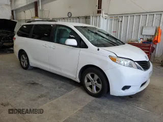 2013 Toyota Sienna LE AAS with VIN 5TDKK3DC5DS286603, listed as a Copart auction lot 56873665 with 195,600 mi miles and Non repairable. Bid and sale history available at DreamBid. Image 4.