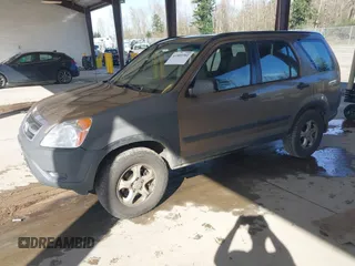 2002 Honda CR-V LX z VIN JHLRD78512C007757, wystawiony jako IAAI lot #41885302 z przebiegiem 177 892 mil mil oraz . Historia ofert i sprzedaży dostępna na DreamBid. Obrazek 2.