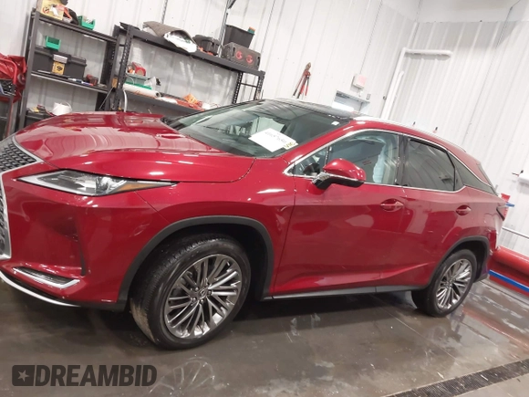 2022 Lexus RX with VIN 2T2JZMDA8NC358766, listed as a IAAI auction lot 41657650 with 17,716 mi miles. Bid and sale history available at carsss.com. Image 14.