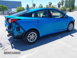 2022 Toyota Prius L Eco with VIN JTDKAMFU1N3164838, listed as a IAAI auction lot 42234309 with 45,451 mi miles and . Bid and sale history available at DreamBid. Image 4.