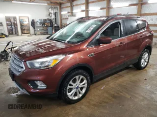 2018 Ford Escape SE z VIN 1FMCU9GD2JUA21582, wystawiony jako Copart lot #56165155 z przebiegiem 88 881 mil mil oraz Czysty tytuł • Clean title. Historia ofert i sprzedaży dostępna na DreamBid. Obrazek 1.