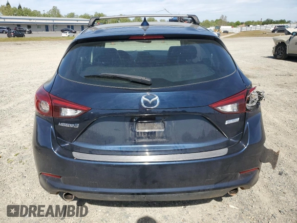 2017 Mazda 3 Grand Touring z VIN 3MZBN1M3XHM148604, wystawiony jako Copart lot #52258885 z przebiegiem Nie podano mil oraz Szkoda całkowita • Salvage title. Historia ofert i sprzedaży dostępna na DreamBid. Obrazek 6.