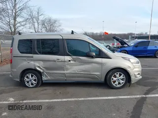 2015 Ford Transit Connect XLT z VIN NM0AE8F74F1179538, wystawiony jako IAAI lot #41505221 z przebiegiem 57 798 mil mil oraz . Historia ofert i sprzedaży dostępna na DreamBid. Obrazek 13.