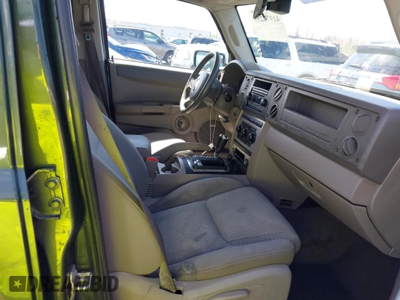2007 Jeep Commander Sport with VIN 1J8HG48P97C691117, listed as a IAAI auction lot 41976259 with 260,996 mi miles. Bid and sale history available at carsss.com. Image 5.