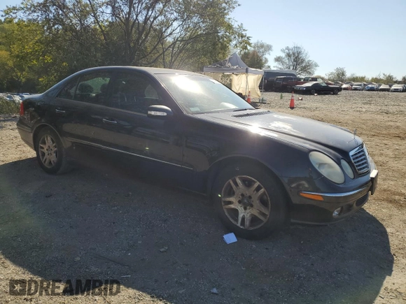 2003 Mercedes-Benz E-Class 3.2L with VIN WDBUF65J03A281430, listed as a Copart auction lot 77086054 with 121,080 mi miles and Salvage Title. Bid and sale history available at carsss.com. Image 4.