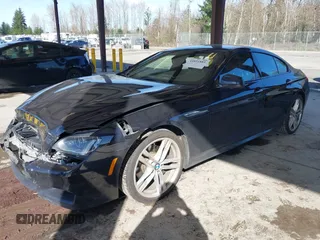 2014 BMW 6 Series 640i xDrive with VIN WBA6B8C5XED452416, listed as a IAAI auction lot 41851885 with 111,445 mi miles and . Bid and sale history available at carsss.com. Image 2.