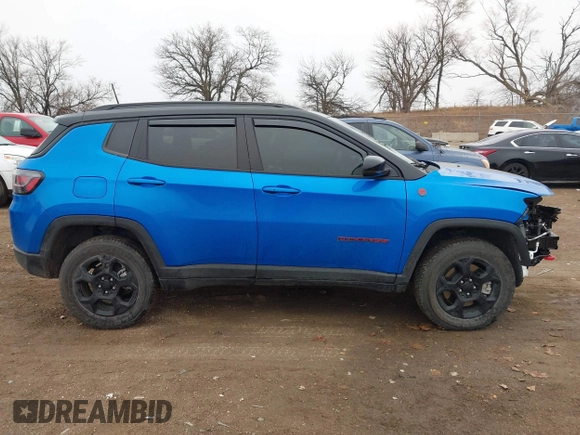 2023 Jeep Compass Trailhawk with VIN 3C4NJDDN8PT551998, listed as a IAAI auction lot 41188039 with 6,531 mi miles and . Bid and sale history available at DreamBid. Image 14.