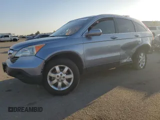 2007 Honda CR-V EX-L z VIN JHLRE38707C061193, wystawiony jako Copart lot #56576805 z przebiegiem 128 083 mil mil oraz Szkoda całkowita • Salvage title. Historia ofert i sprzedaży dostępna na DreamBid. Obrazek 1.