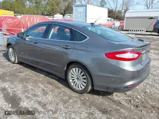 2014 Ford Fusion Energi Titanium with VIN 3FA6P0SUXER216960, listed as a IAAI auction lot 41339413 with 85,025 mi miles. Bid and sale history available at carsss.com. Image 3.