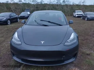 2021 Tesla Model 3 Performance with VIN 5YJ3E1EC9MF015708, listed as a IAAI auction lot 40545406 with 1 mi miles. Bid and sale history available at carsss.com. Image 6.