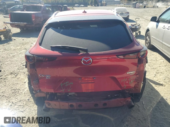 2021 Mazda CX-30 Premium with VIN 3MVDMBDY0MM312354, listed as a Copart auction lot 77112334 with 47,351 mi miles and Salvage Title. Bid and sale history available at carsss.com. Image 6.