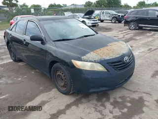 2007 Toyota Camry CE with VIN 4T1BE46K27U513940, listed as a IAAI auction lot 42108691 with 331,435 mi miles. Bid and sale history available at carsss.com. Image 1.