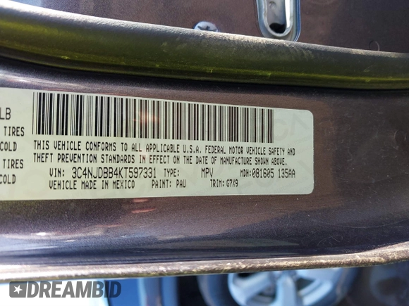 2019 Jeep Compass Latitude with VIN 3C4NJDBB4KT597331, listed as a IAAI auction lot 41664673 with 98,042 mi miles. Bid and sale history available at carsss.com. Image 9.