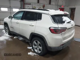 2020 Jeep Compass Latitude with VIN 3C4NJDBB3LT138454, listed as a IAAI auction lot 41614631 with 82,079 mi miles and . Bid and sale history available at DreamBid. Image 3.