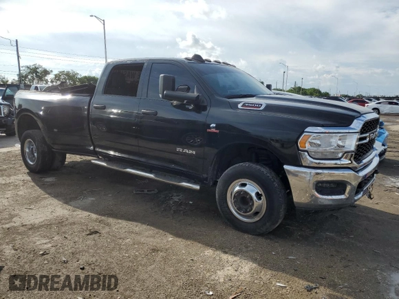 2021 Ram 3500 Tradesman with VIN 3C63RRGL3MG666284, listed as a Copart auction lot 71213634 with 22,582 mi miles and Salvage Title. Bid and sale history available at carsss.com. Image 4.
