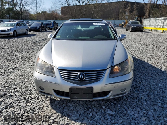 2005 Acura RL z VIN JH4KB165X5C014519, wystawiony jako Copart lot #63648925 z przebiegiem 215 443 mil mil oraz Nie do naprawy • Non repairable. Historia ofert i sprzedaży dostępna na DreamBid. Obrazek 5.